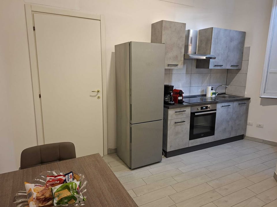 Full-size fridge, oven, stovetop, espresso maker