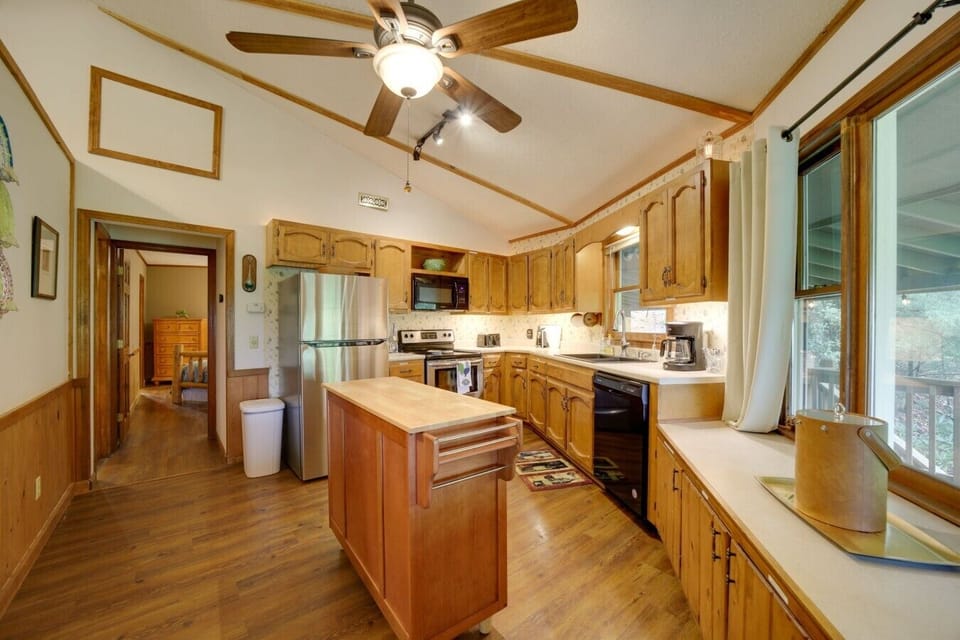 Kitchen | Wood Cabinetry & Center Island | Open Cabin Layout