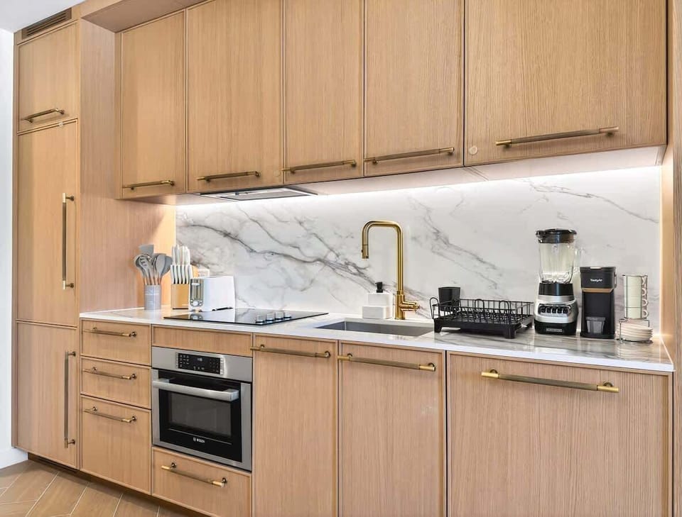 Fully equipped modern kitchen with sleek finishes