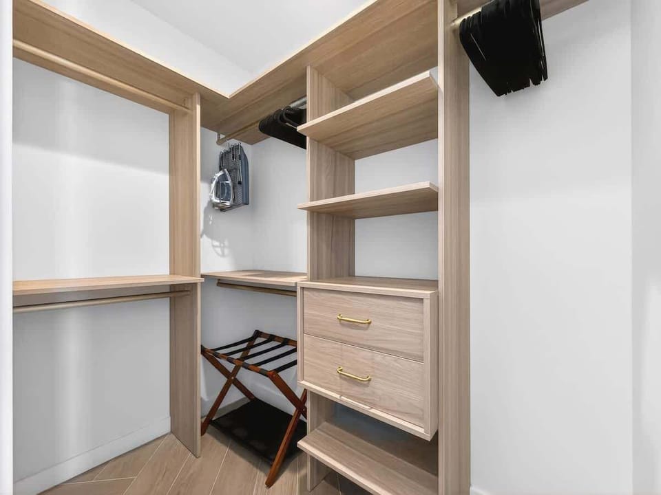 Spacious walk-in closet with ample storage space