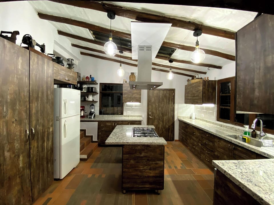 Deluxe House, Patio, Garden View | Private kitchen | Fridge, microwave, oven, stovetop