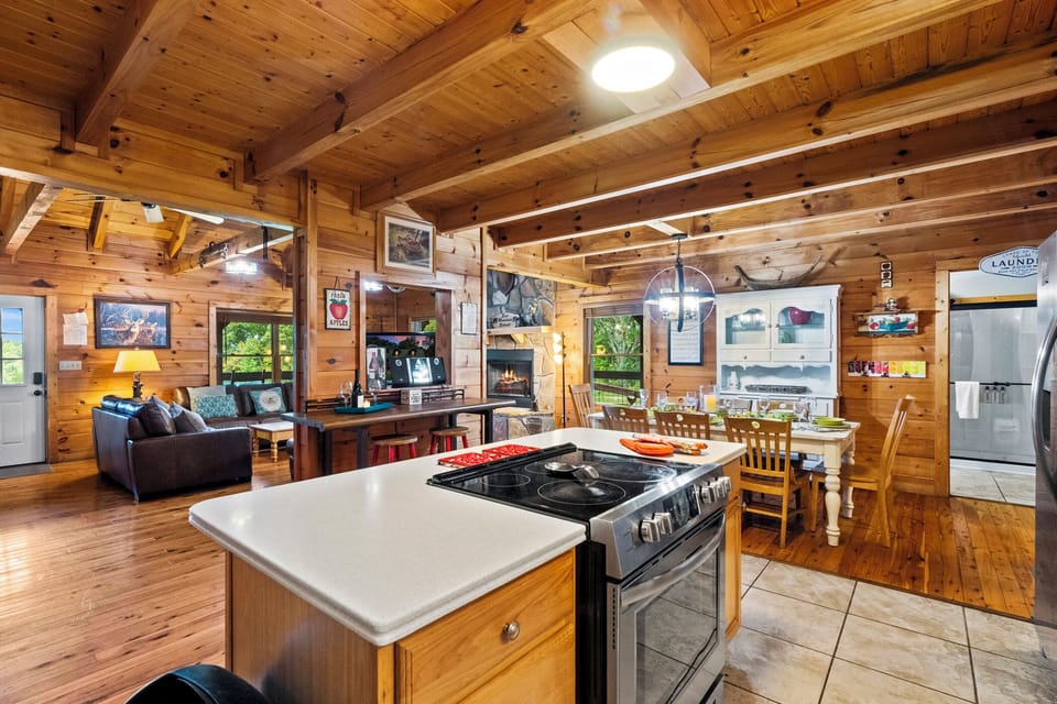 Kitchen and Dining room with Living Room in background.