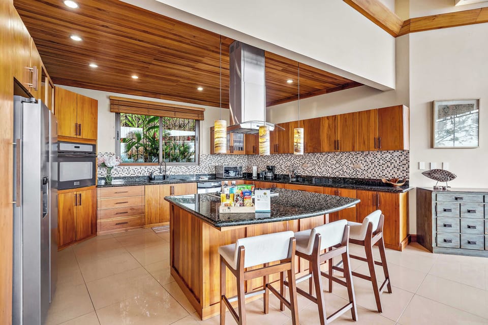 Gather around, this kitchen was made for memories.