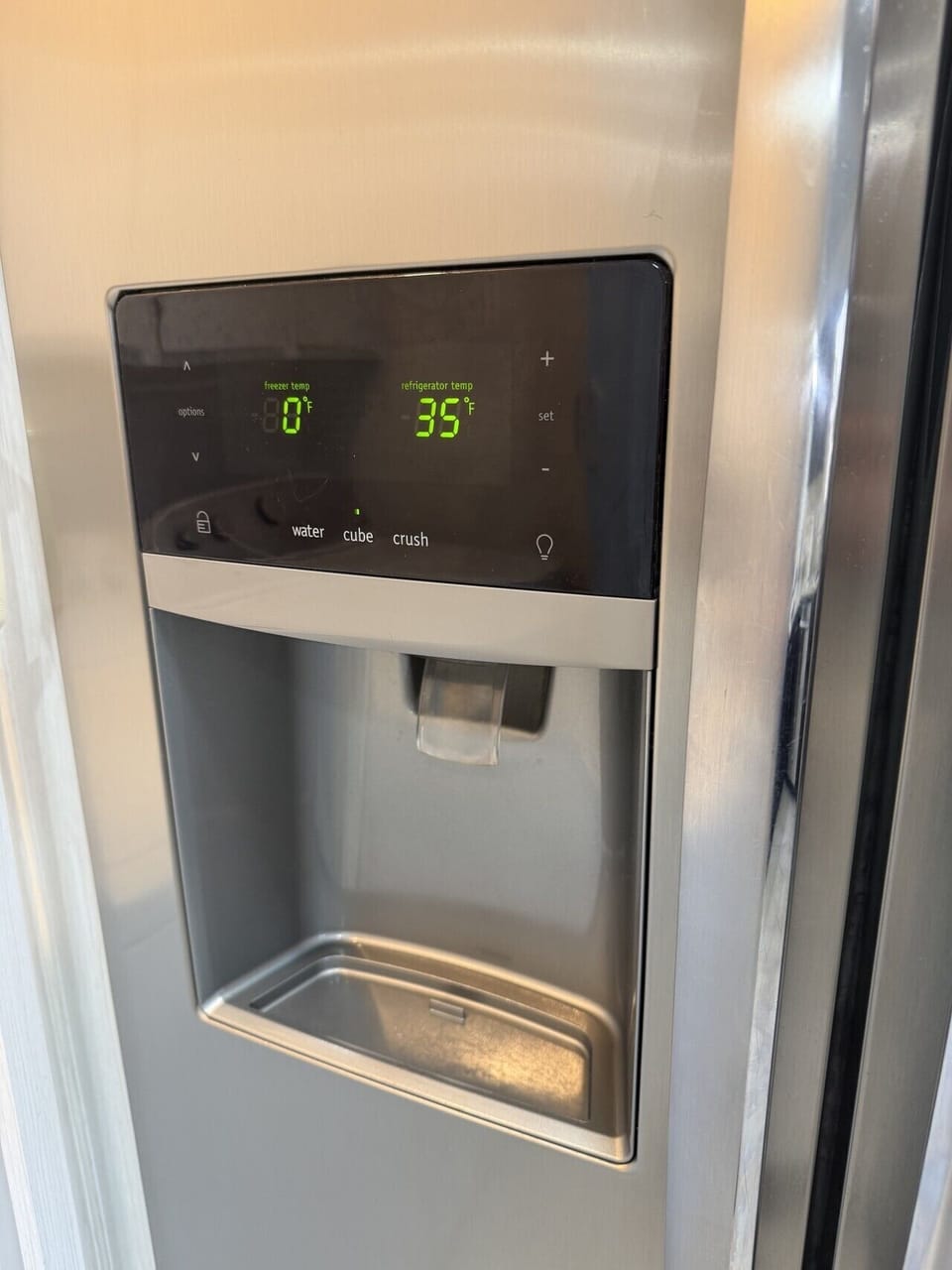 Full-size refrigerator with water and ice dispenser