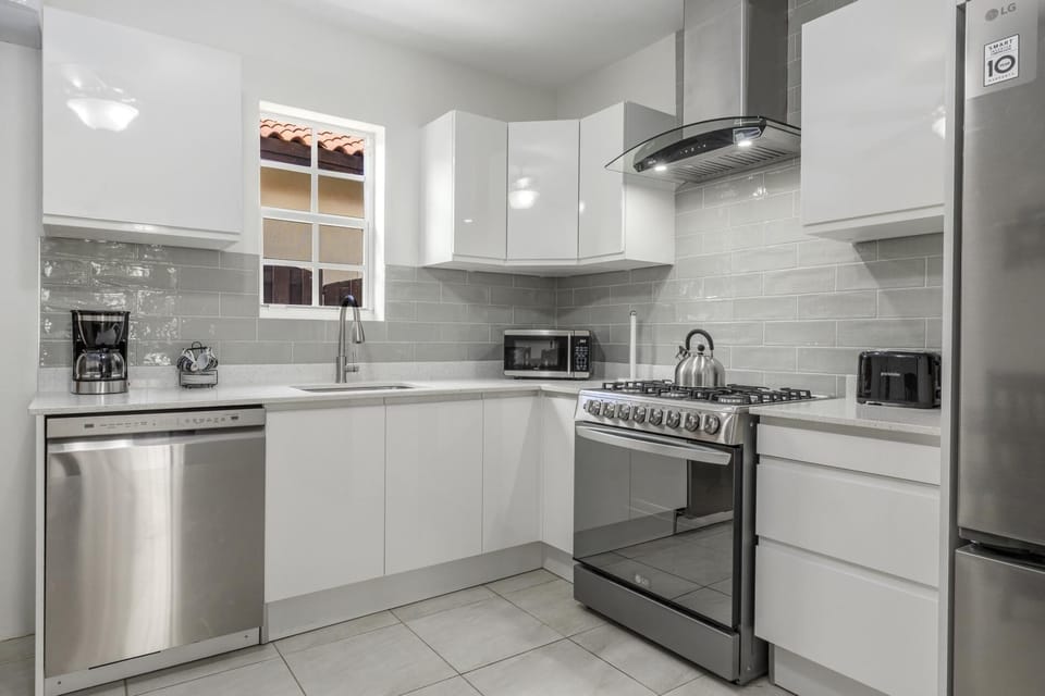 The fully equipped kitchen combines modern convenience with island charm, making it easy to prepare everything from quick beach snacks to family-style dinners