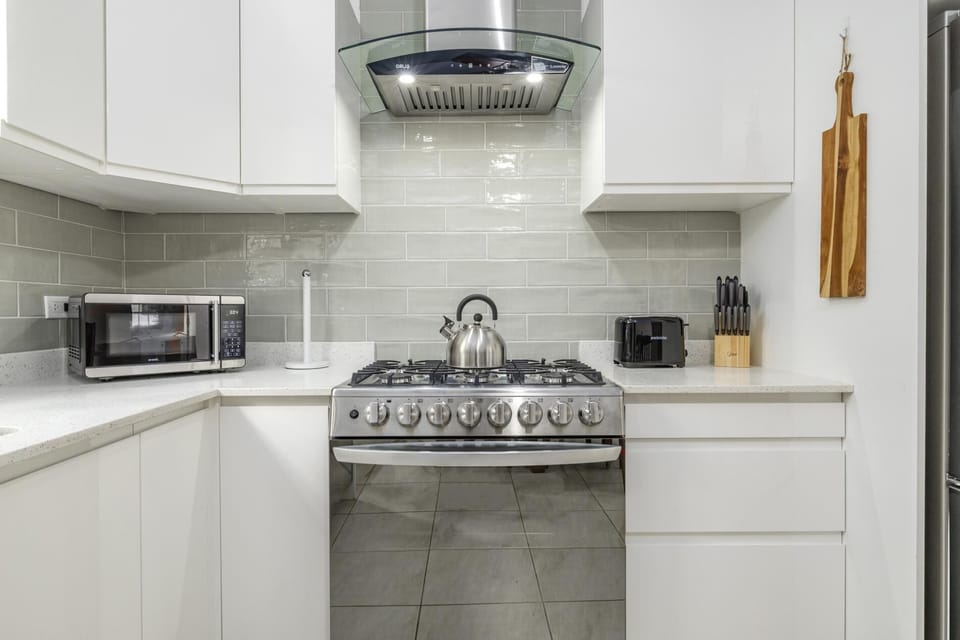 The fully equipped kitchen combines modern convenience with island charm, making it easy to prepare everything from quick beach snacks to family-style dinners