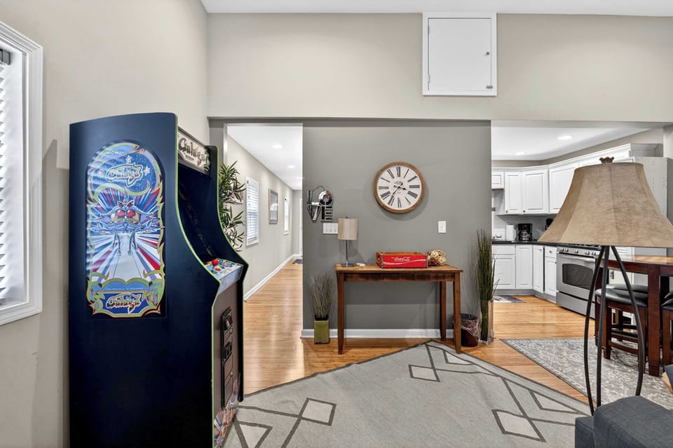 Living Room: Spacious living area with cozy furnishings, natural light, and modern touches. A comfortable space to unwind, socialize, or enjoy a movie night.