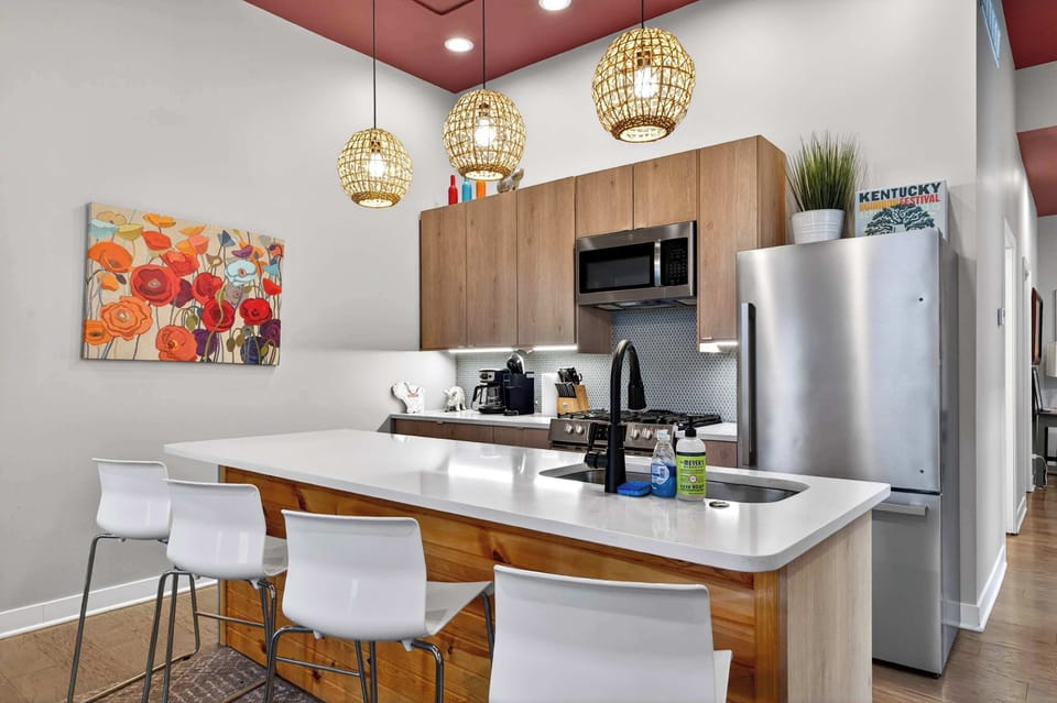 Kitchen: Fully equipped kitchen with modern appliances, cookware, and essentials for preparing anything from a quick breakfast to a family dinner during your stay.