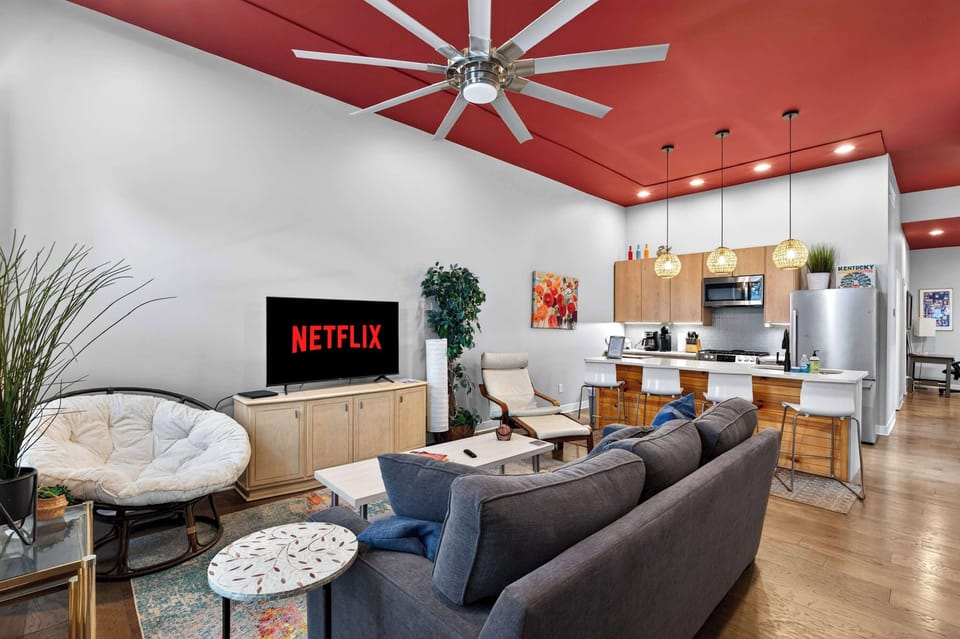 Living Room: Unwind in the cozy living area featuring plush seating, stylish décor, and a smart TV. A welcoming space designed for movie nights, conversation, and relaxation.