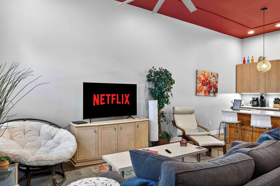 Living Room: Unwind in the cozy living area featuring plush seating, stylish décor, and a smart TV. A welcoming space designed for movie nights, conversation, and relaxation.