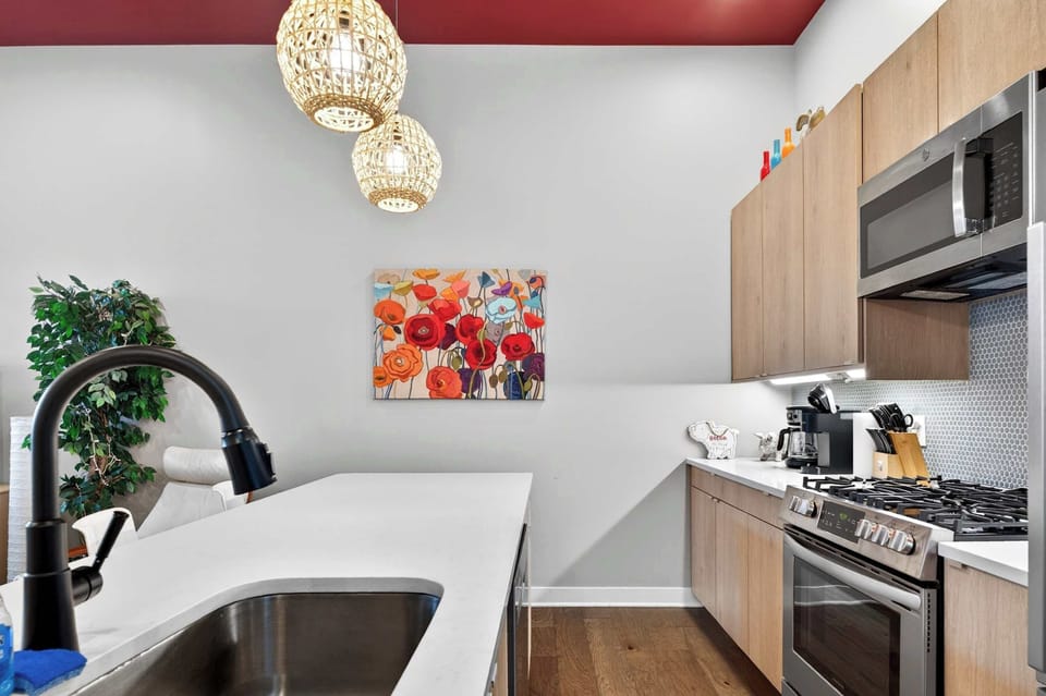 Kitchen: Fully equipped kitchen with modern appliances, cookware, and essentials for preparing anything from a quick breakfast to a family dinner during your stay.