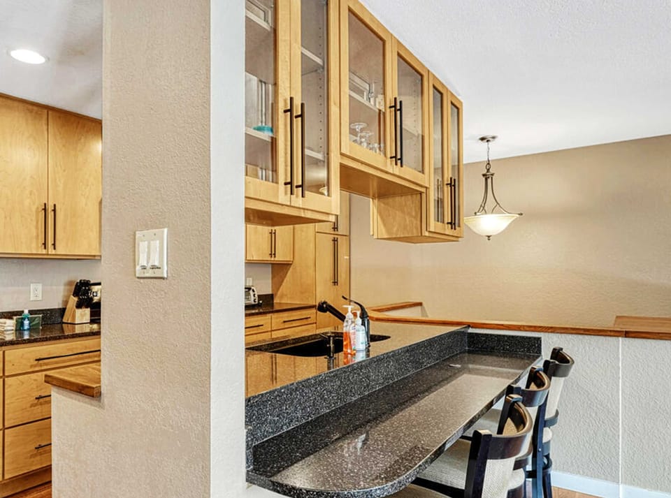 The cozy kitchen is well equipped for an unforgettable getaway​
