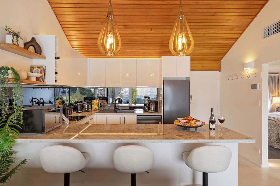 Kitchen: Sleek design meets stunning views—cook up memories in style!