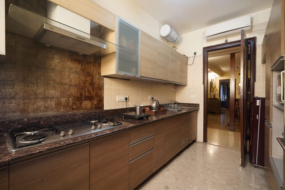 Apartment | Private kitchen | Full-size fridge, coffee/tea maker