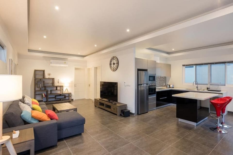 Villa, Garden View | Living area | Flat-screen TV