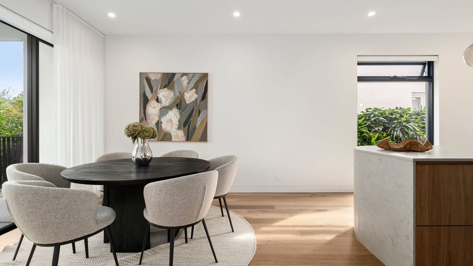 Bright dining area flowing seamlessly to the living space for easy entertaining