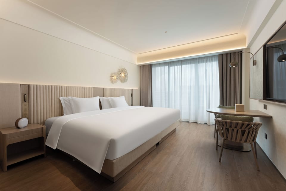 Superior Room, Hill View | Down comforters, minibar, desk, blackout drapes