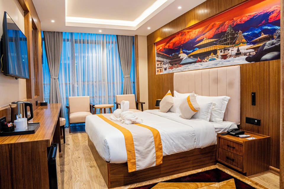 Deluxe Suite, City View | In-room safe, desk, laptop workspace, soundproofing