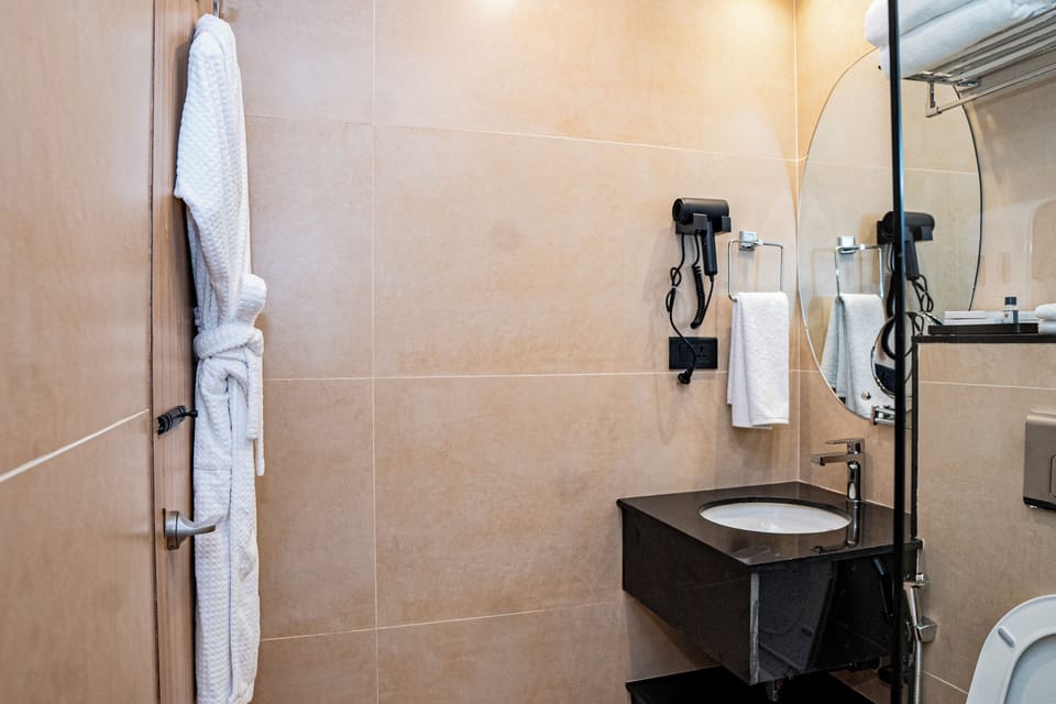 Hair dryer, slippers, towels, soap