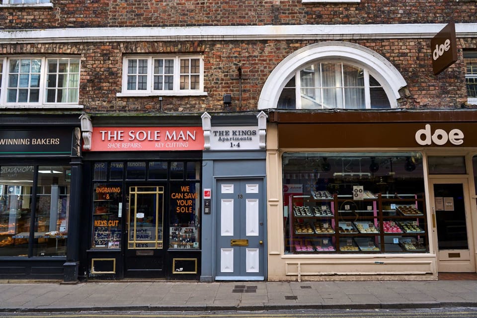 Enjoy unbeatable convenience with a private street-level entrance set among charming local storefronts, bakeries, and boutiques, putting vibrant neighborhood culture directly at your doorstep.