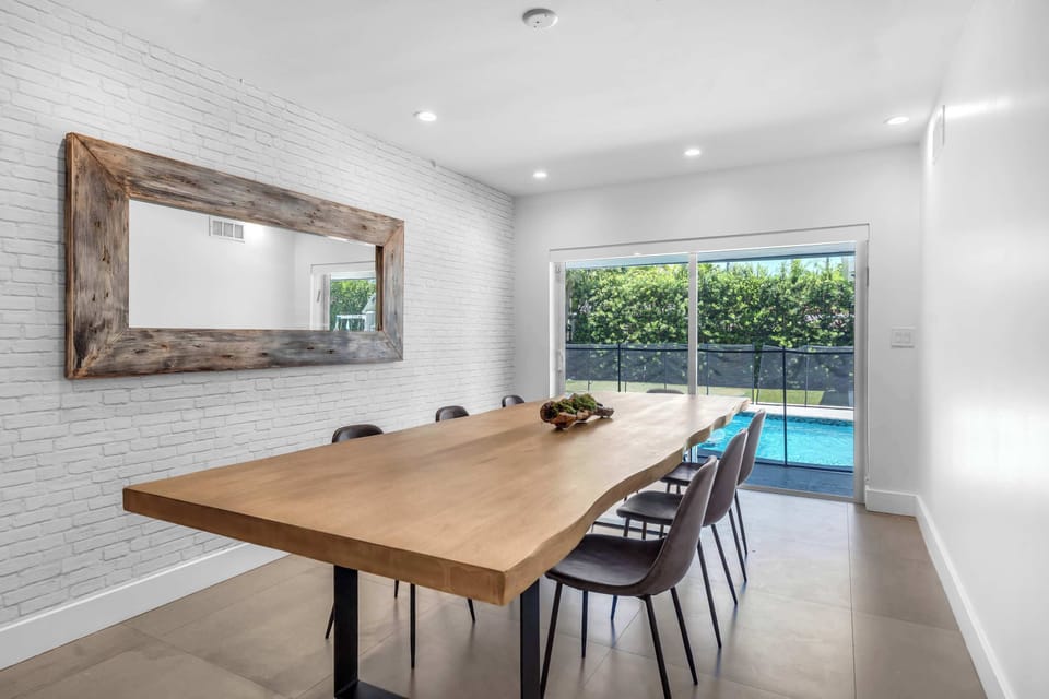 Make mealtime memories together at the formal dining table, seating 14+​