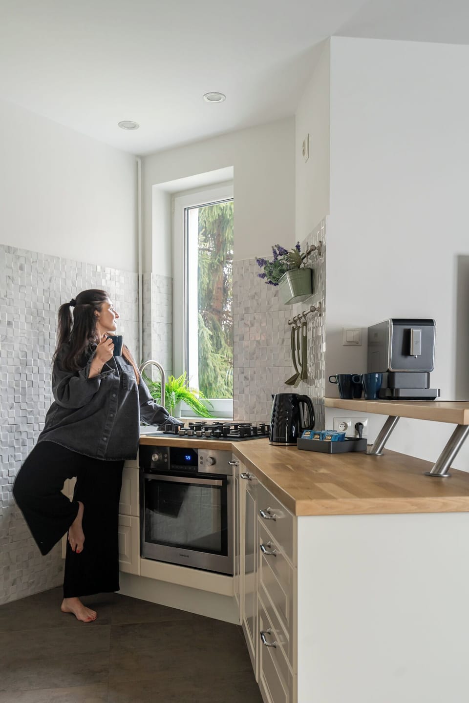 Deluxe Apartment, Balcony, Beachside | Private kitchen | Coffee/tea maker, electric kettle, highchair, dining tables