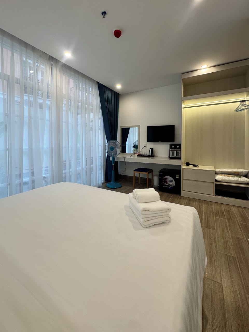 Family Room, Balcony, Courtyard View | Desk, laptop workspace, free WiFi, bed sheets