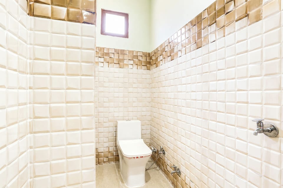 Shower, rainfall showerhead, slippers, towels