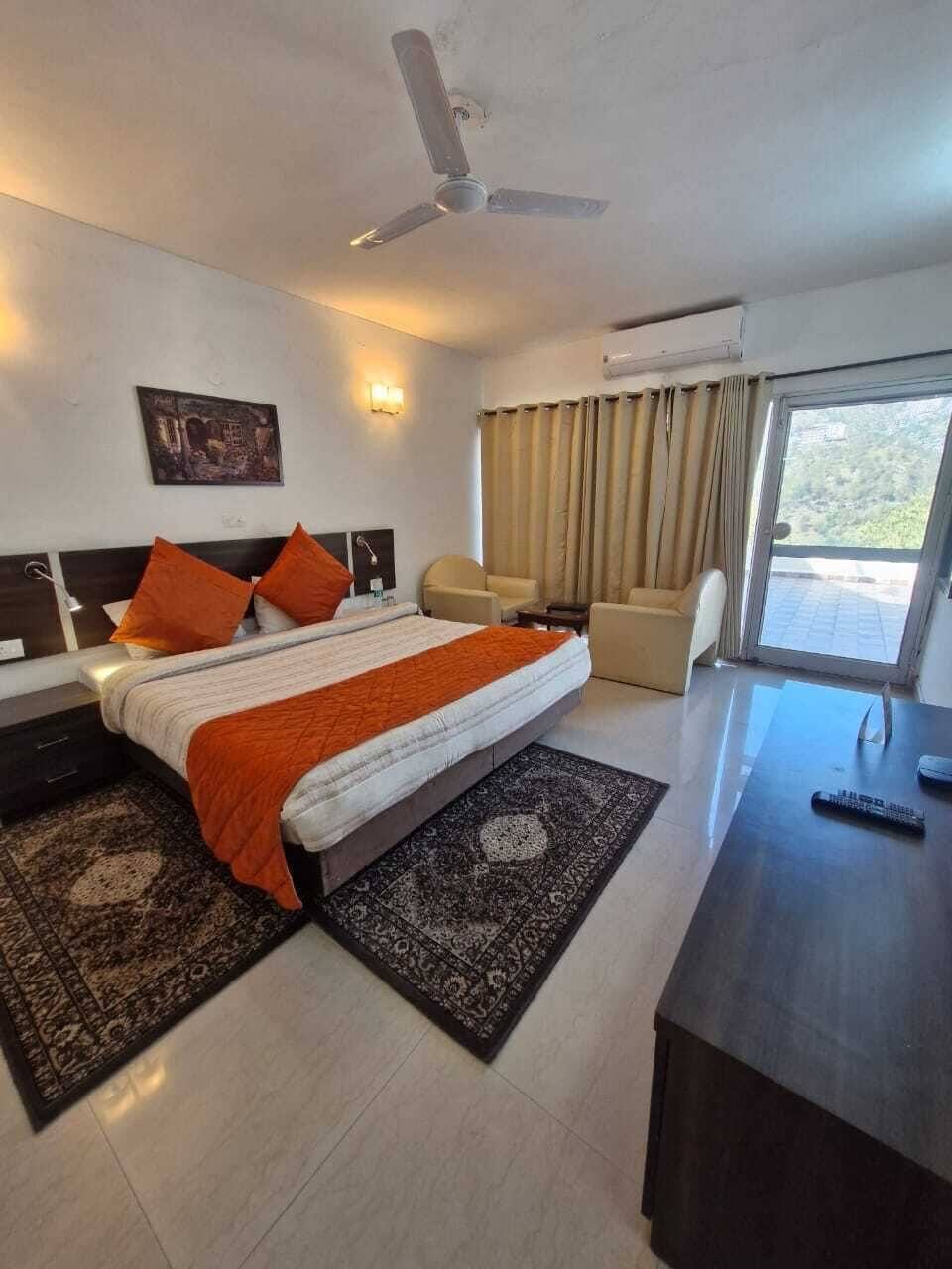 Luxury Suite, Balcony, Mountain View | Laptop workspace, iron/ironing board (on request), WiFi (free)