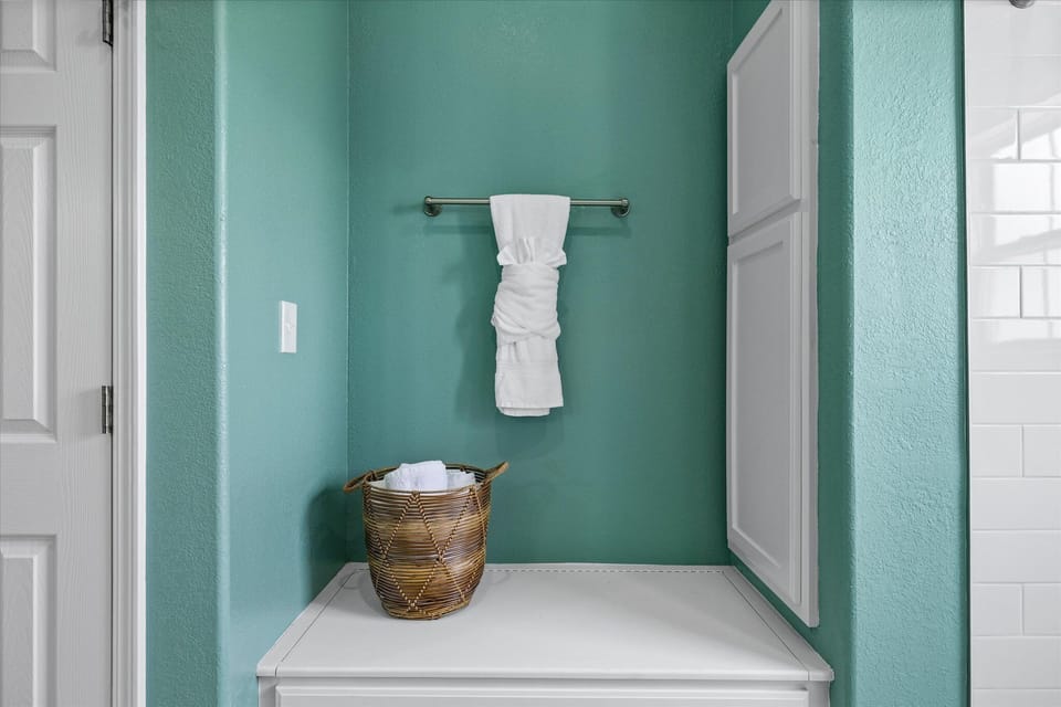 Primary Bathroom with plenty of storage. Extra towels provided!