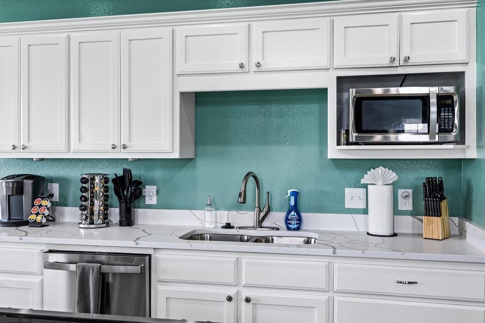 Knives, utensils, paper towels, dish soap, hand soap, spices, crock pot, pans+++