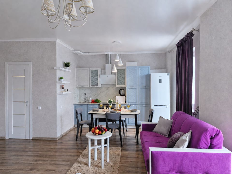 Comfort Studio, Balcony, City View | Living area | Flat-screen TV