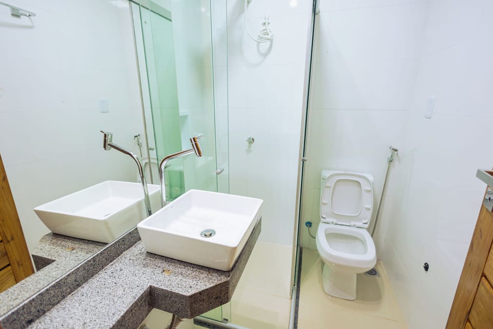 Shower, towels, soap, toilet paper
