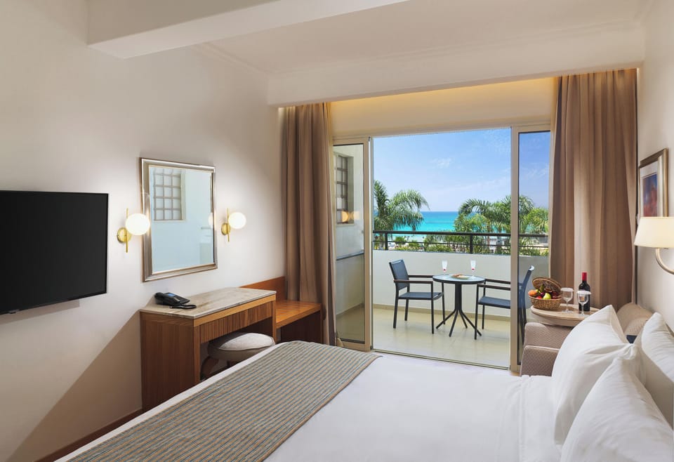 Superior Room, Sea View (Olympic Bay) | Free minibar items, in-room safe, desk, free WiFi