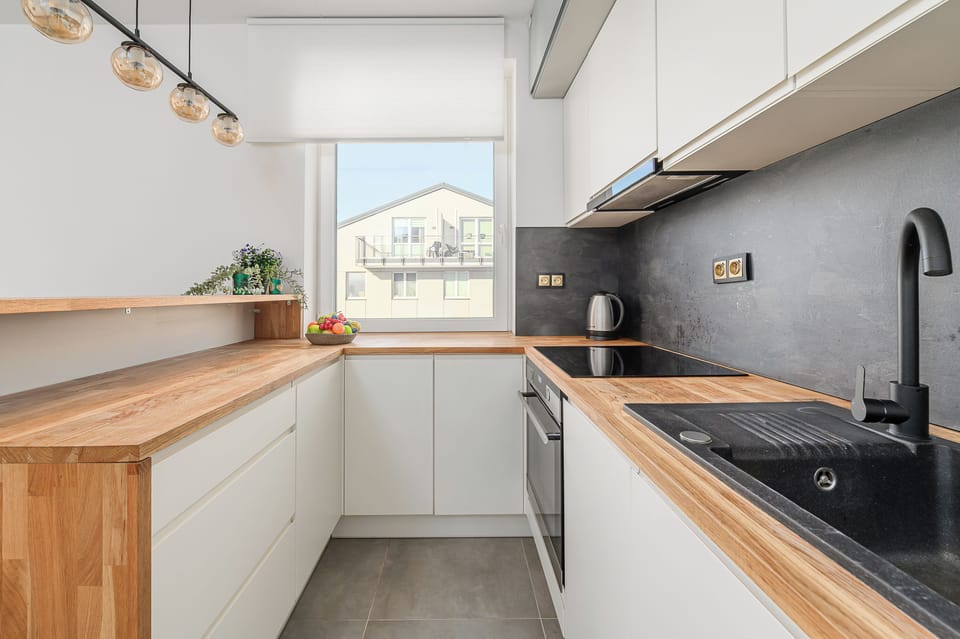 Family Apartment, Balcony, Courtyard View | Private kitchen | Electric kettle