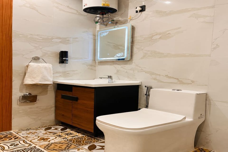 Shower, towels, soap, toilet paper