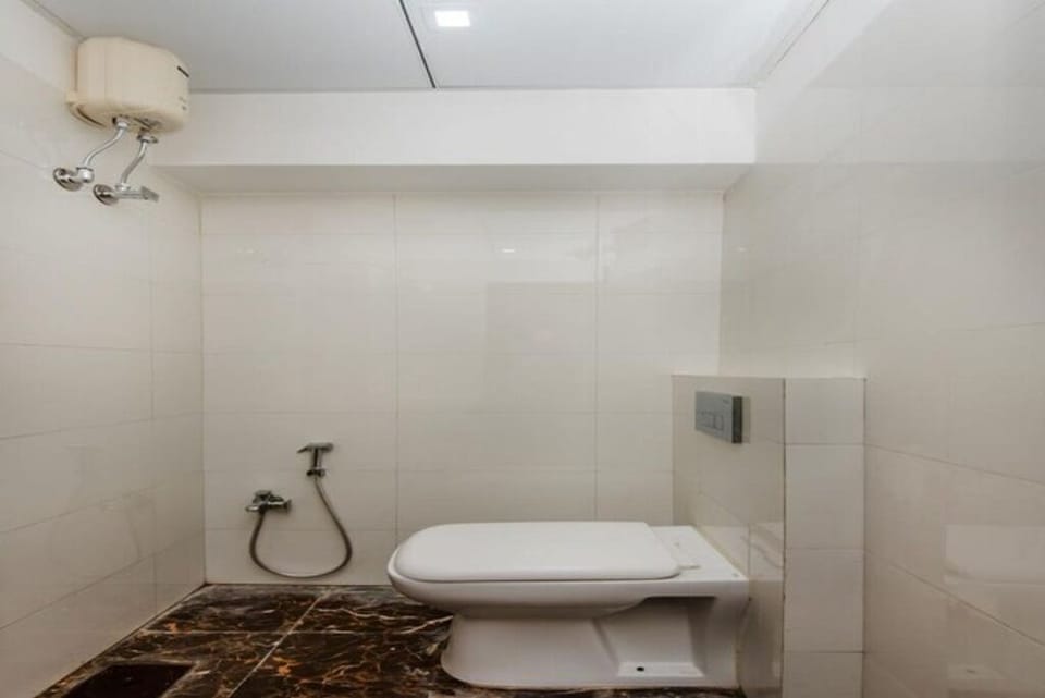 Deluxe Room, City View | Bathroom | Shower, towels, soap, toilet paper