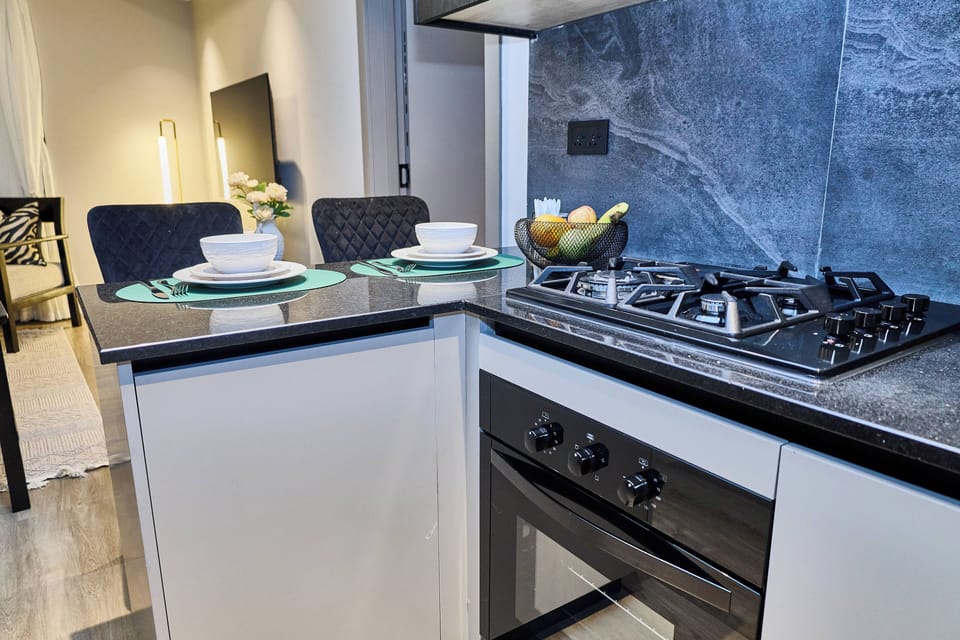 Superior Apartment, City View | Private kitchen | Full-size fridge, microwave, oven, stovetop
