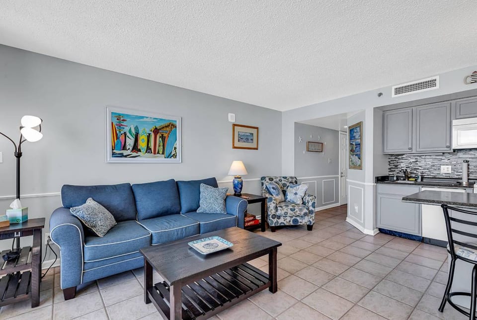 Signature Condo, 1 Bedroom, Ocean View, Oceanfront | Living room | 55-inch Smart TV with digital channels