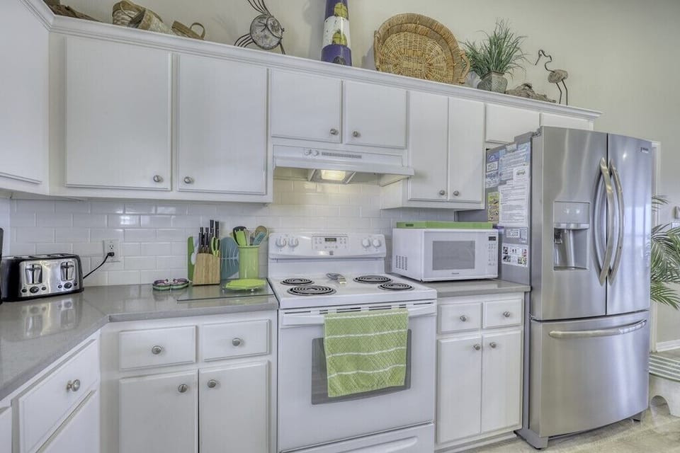 Your fully-equipped kitchen is ready for home-cooked meals with modern appliances, ample counter space, and all the tools you need to whip up your favorite dishes.