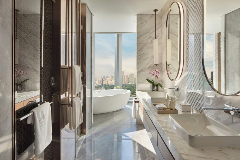 Separate tub and shower, slippers, towels