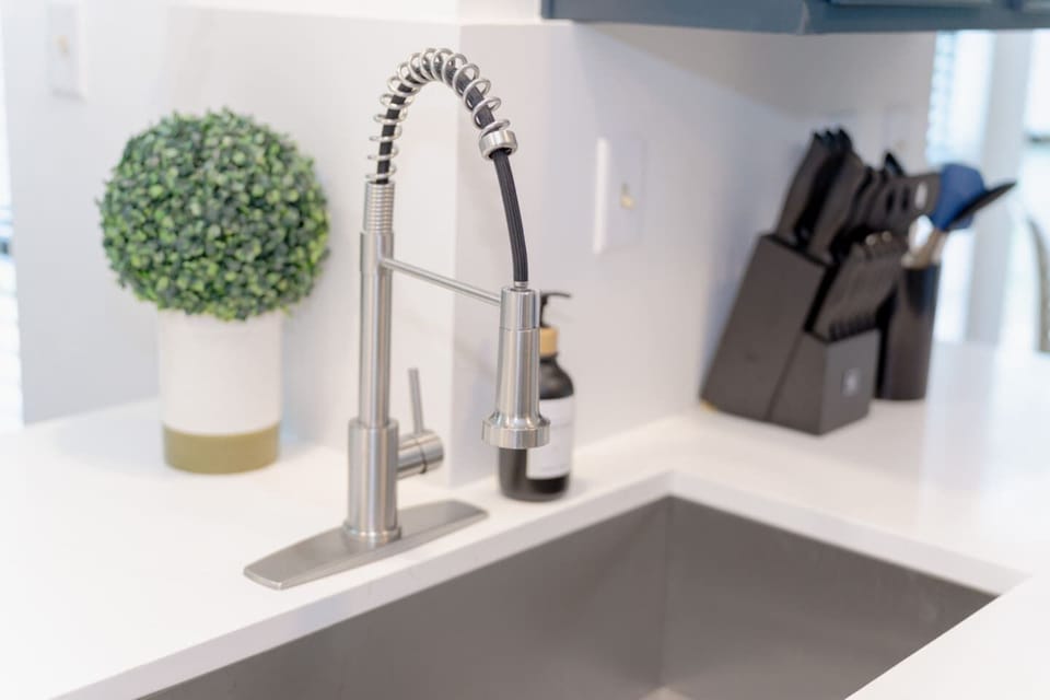 Sleek kitchen faucet and counter space for easy meal prep.