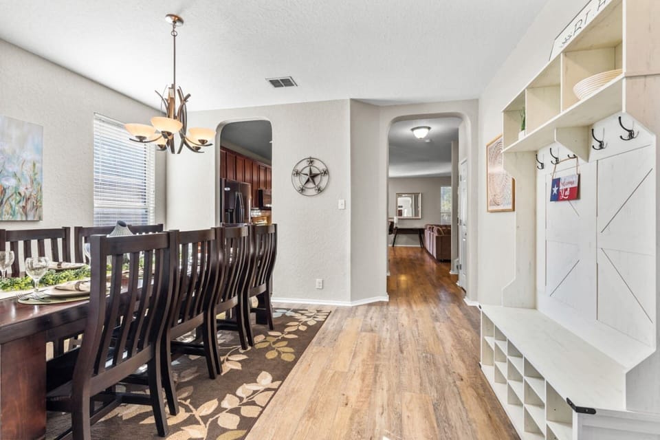 Practical entryway with coat hooks and shoe station, perfect for keeping essentials organized as you come and go.