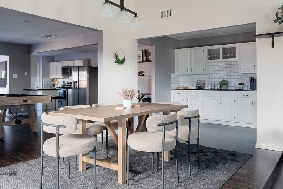 Enjoy the comfortable dining room chairs and gather around the table for morning coffee or a delicious, home-cooked meal. There is a coffee bar to make mornings delightful and a pool table to make memories with your group!
