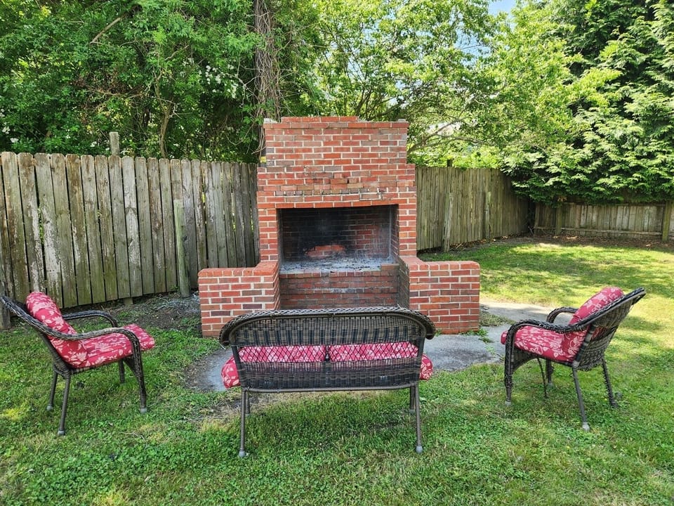 Charming brick fire pit, perfect setting for warm, cozy evenings