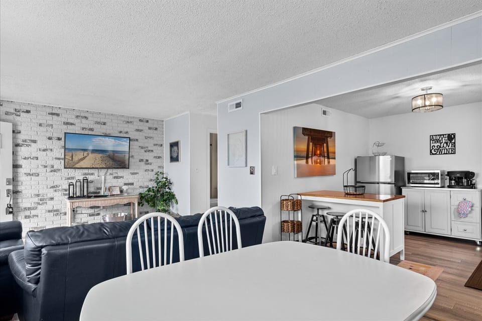 Gather around the dining table for a bite to eat.
