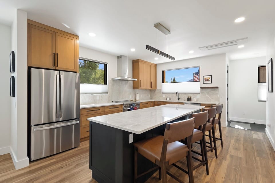 Welcome to Mountain Elegance - This beautifully furnished retreat features high-end stainless-steel appliances, large granite countertops, kitchen island and a walk-in pantry.