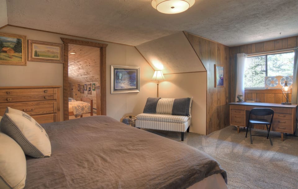 Ferguson Cabin - Second-story king bedroom with a remote workstation.  Please note that the 4th bedroom is accessed from this bedroom and also the upper-level deck.