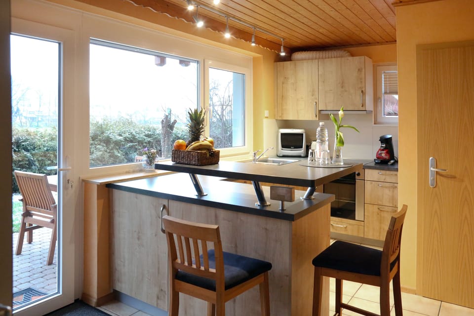 Apartment, 2 Bedrooms, Patio | Private kitchen | Full-size fridge, microwave, oven, stovetop