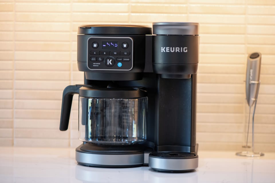 Keurig coffee maker with K-Cup and carafe options, providing flexible brewing for every guest preference.